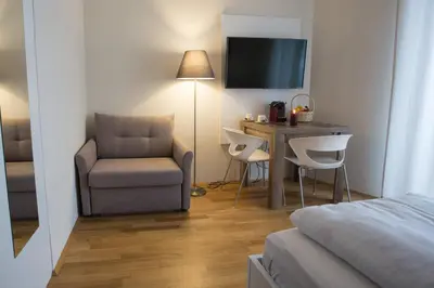 Ein Sitzbereich in der Unterkunft Premium Apartment München Messe
