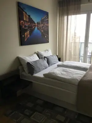 Ein Bett oder Betten in einem Zimmer der Unterkunft Premium Apartment München Messe