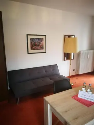Ein Sitzbereich in der Unterkunft Hotel Luitpold