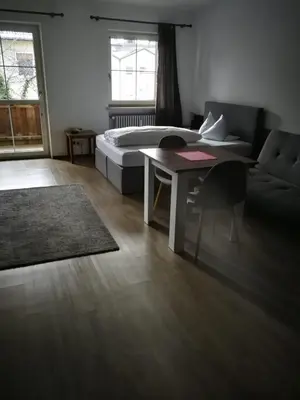 Ein Bett oder Betten in einem Zimmer der Unterkunft Hotel Luitpold
