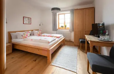 Ein Bett oder Betten in einem Zimmer der Unterkunft Pension Bernhardhof
