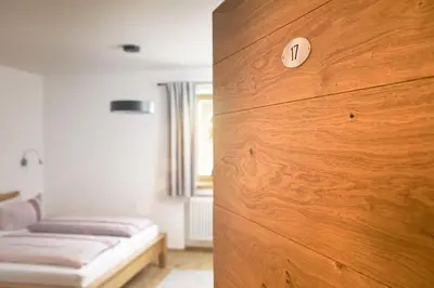 Ein Bett oder Betten in einem Zimmer der Unterkunft Pension Bernhardhof