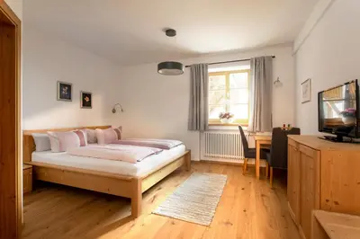 Ein Bett oder Betten in einem Zimmer der Unterkunft Pension Bernhardhof
