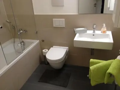 Ein Badezimmer in der Unterkunft City Apartment Munich