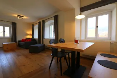 Ein Sitzbereich in der Unterkunft Ferienwohnungen im Gasthof Stern inklusive KönigsCard