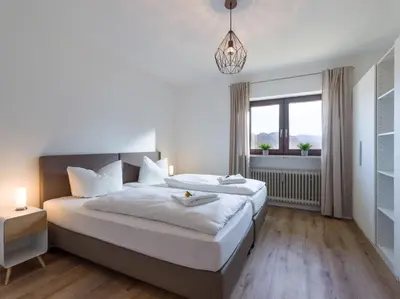 Ein Bett oder Betten in einem Zimmer der Unterkunft Zahmer Kaiser