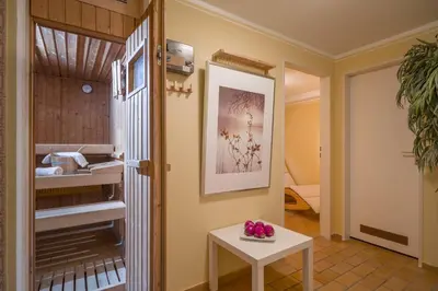 Ein Bett oder Betten in einem Zimmer der Unterkunft Bergschlössl - Massionettwohnung 22