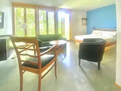 Ein Bett oder Betten in einem Zimmer der Unterkunft Loft mit Dachterrasse