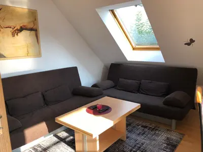 Ein Sitzbereich in der Unterkunft Ferienwohnung Aretsried 2
