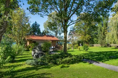 Ein Garten an der Unterkunft Appartementhaus „die Kuh am See“ (vormals Haus St. Leonhard)