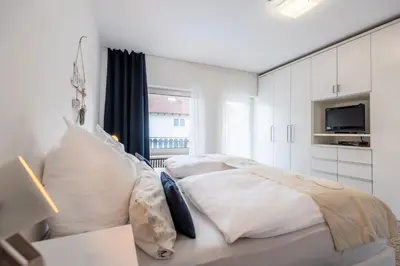 Ein Bett oder Betten in einem Zimmer der Unterkunft DARFATI 4-Zimmer Wohnung