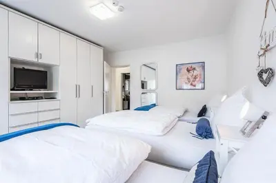 Ein Bett oder Betten in einem Zimmer der Unterkunft DARFATI 4-Zimmer Wohnung