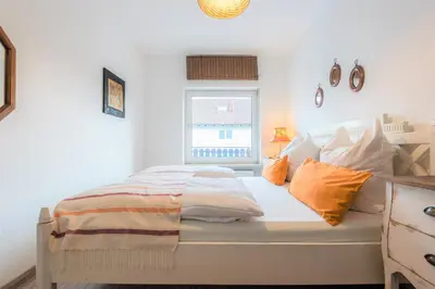 Ein Bett oder Betten in einem Zimmer der Unterkunft DARFATI 4-Zimmer Wohnung