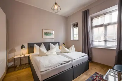 Ein Bett oder Betten in einem Zimmer der Unterkunft Villa Stigloh