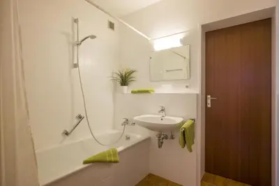 Ein Badezimmer in der Unterkunft Bergschlössl - Maissonettwohnung 15