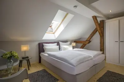 Ein Bett oder Betten in einem Zimmer der Unterkunft Villa Kaiser