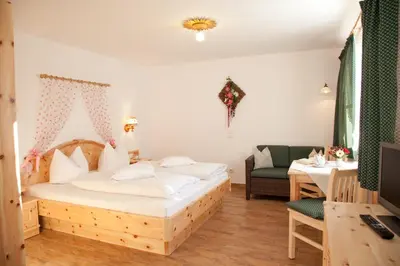 Ein Bett oder Betten in einem Zimmer der Unterkunft Ferienhof Zum Sagschneider