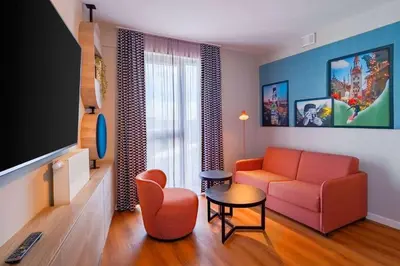 TV/Unterhaltungsangebot in der Unterkunft Ramada Encore by Wyndham Munich Messe