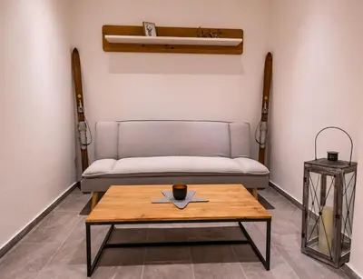 Ein Sitzbereich in der Unterkunft Gapartments