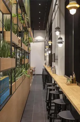 Ein Restaurant oder anderes Speiselokal in der Unterkunft Andaz Munich Schwabinger Tor, By Hyatt