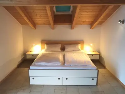 Ein Bett oder Betten in einem Zimmer der Unterkunft Ferienwohnungen Wagenstaller