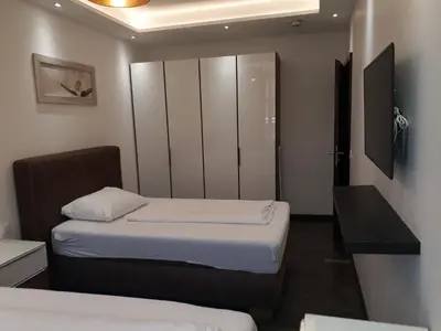 Ein Bett oder Betten in einem Zimmer der Unterkunft Royal Boardinghouse GmbH - Munich