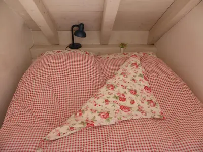 Ein Bett oder Betten in einem Zimmer der Unterkunft Bed and Breakfast Bavaria München