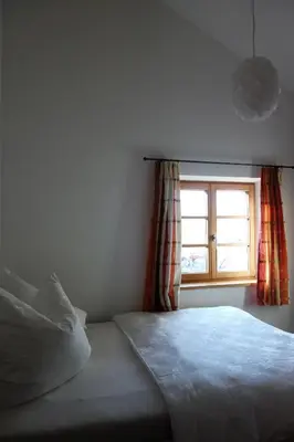 Ein Bett oder Betten in einem Zimmer der Unterkunft Appartement - Ferienwohnung - FeWo Heuboden