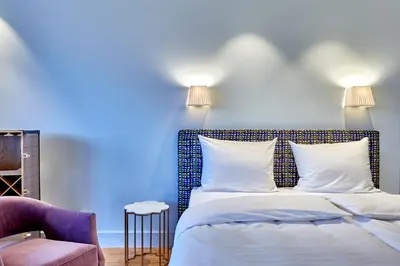 Ein Bett oder Betten in einem Zimmer der Unterkunft Jugend- und Familienhotel Augustin