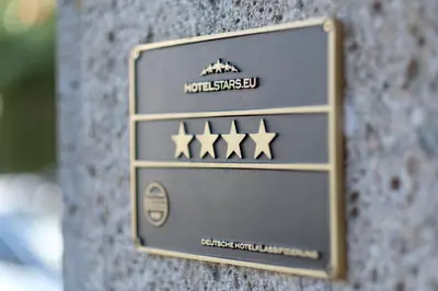 Ein Zertifikat, Auszeichnung, Logo oder anderes Dokument, das in der Unterkunft Hotel Ziegleder ausgestellt ist