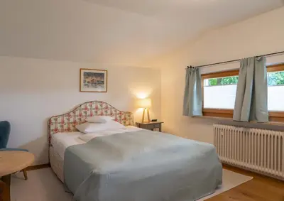 Ein Bett oder Betten in einem Zimmer der Unterkunft Hotel Ziegleder