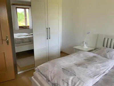 Ein Bett oder Betten in einem Zimmer der Unterkunft Ferienwohnung Christensen
