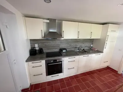 Küche/Küchenzeile in der Unterkunft Fünf Seen Apartments