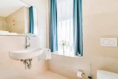 Ein Badezimmer in der Unterkunft Hotel-Etage Apfelrot managed by Hotel Apfelbaum