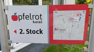 Ein Zertifikat, Auszeichnung, Logo oder anderes Dokument, das in der Unterkunft Hotel-Etage Apfelrot managed by Hotel Apfelbaum ausgestellt ist