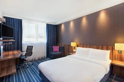 Ein Bett oder Betten in einem Zimmer der Unterkunft Holiday Inn Express Augsburg by IHG