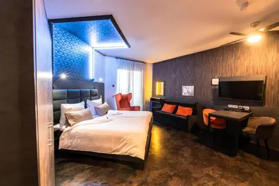 Ein Bett oder Betten in einem Zimmer der Unterkunft GS Hotel