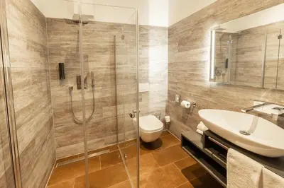 Ein Badezimmer in der Unterkunft GS Hotel