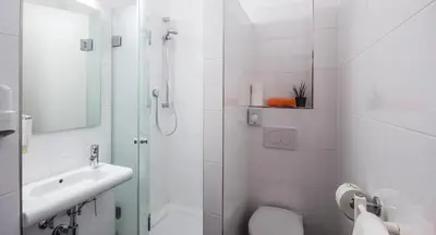 Ein Badezimmer in der Unterkunft GS Hotel