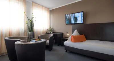 Ein Bett oder Betten in einem Zimmer der Unterkunft GS Hotel