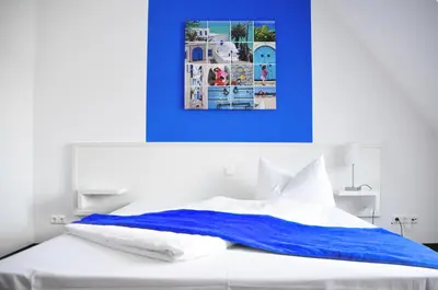 Ein Bett oder Betten in einem Zimmer der Unterkunft Hotel zum Brunnen