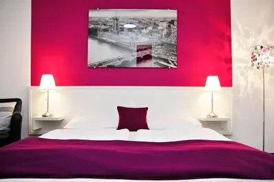Ein Bett oder Betten in einem Zimmer der Unterkunft Hotel zum Brunnen