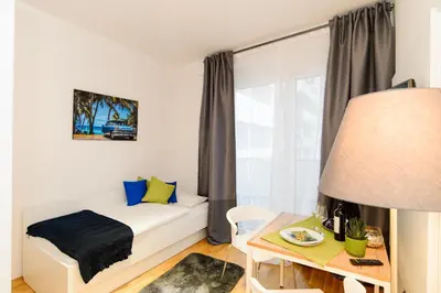 Ein Bett oder Betten in einem Zimmer der Unterkunft Apart Hotel Messe Munich - my room Apartments