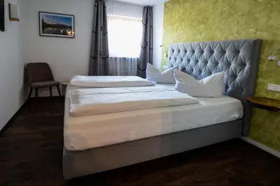 Ein Bett oder Betten in einem Zimmer der Unterkunft Seehotel zur Post