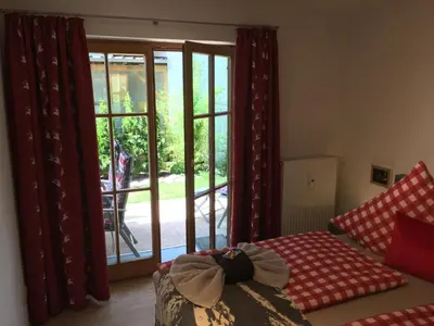 Ein Bett oder Betten in einem Zimmer der Unterkunft ALPENFREUND
