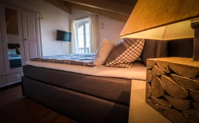 Ein Bett oder Betten in einem Zimmer der Unterkunft Alpenwohnung Neuner