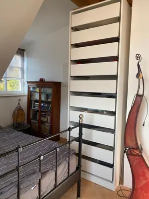 Ein Bett oder Betten in einem Zimmer der Unterkunft Helle und ruhige Dachgeschosswohnung