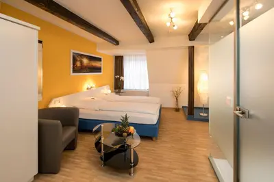 Ein Bett oder Betten in einem Zimmer der Unterkunft Hotel Alte Post