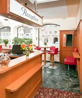 Ein Sitzbereich in der Unterkunft Hotel Alte Post