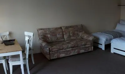 Ein Sitzbereich in der Unterkunft Sunny 1-room apartment near railway station